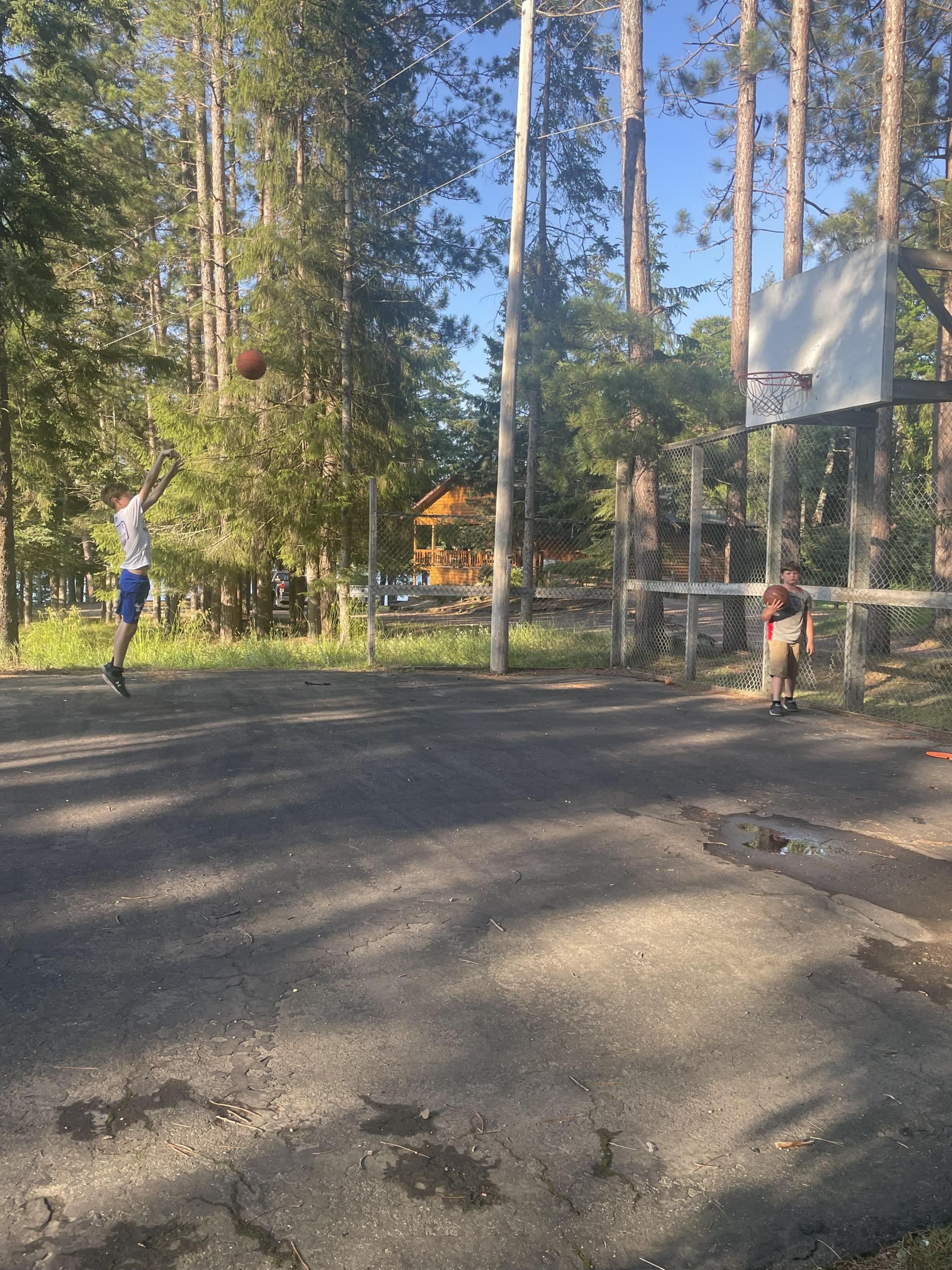 shooting some hoops on the basketball court